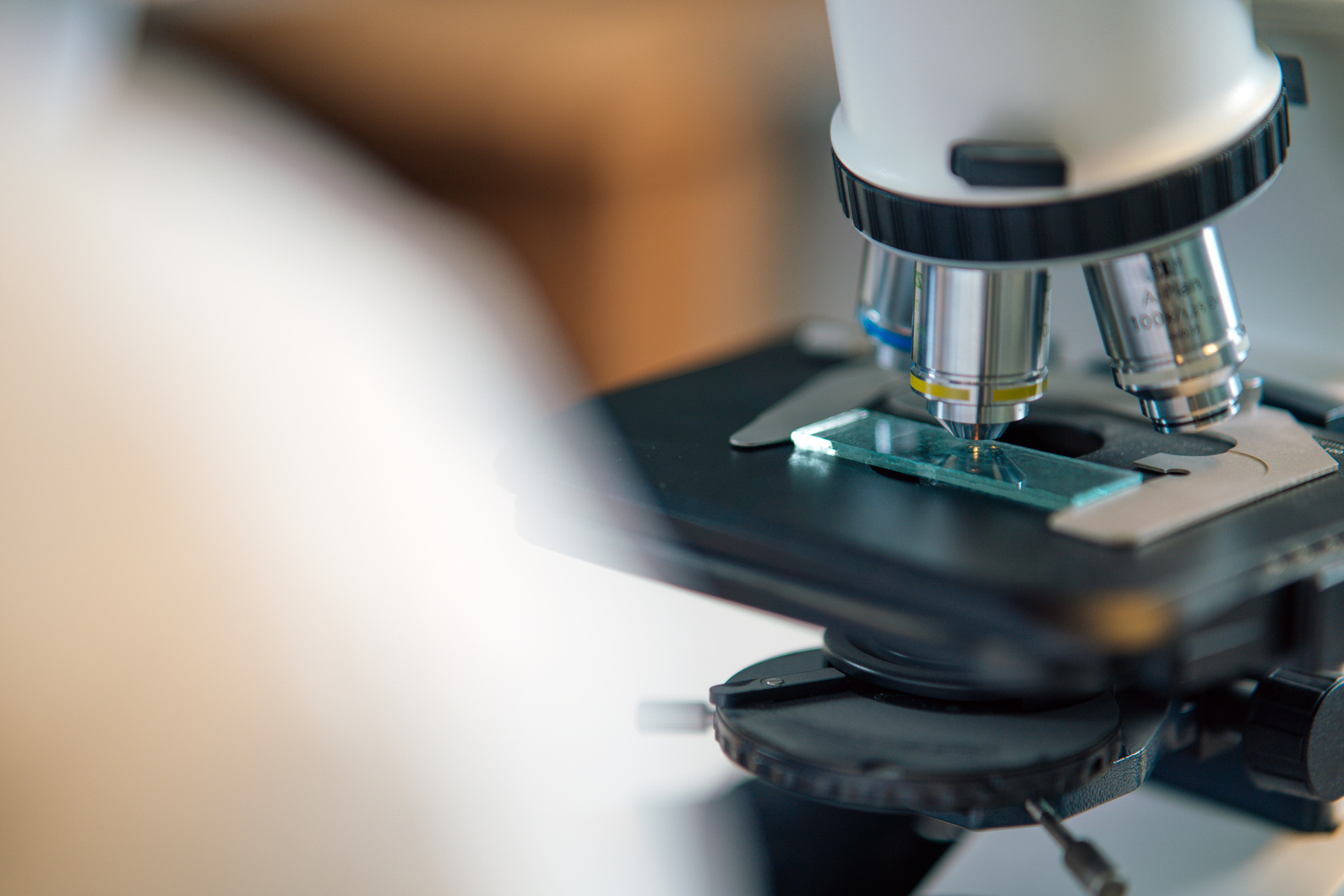 A Glass Slide on a Microscope 